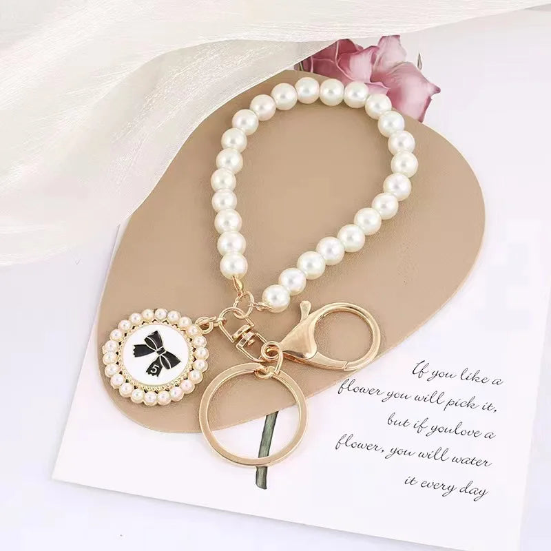 Cute Pearl Keychain – Shiny Pearl Bead Shell Pendant for Bags, Phones, Backpacks, and Car Keys