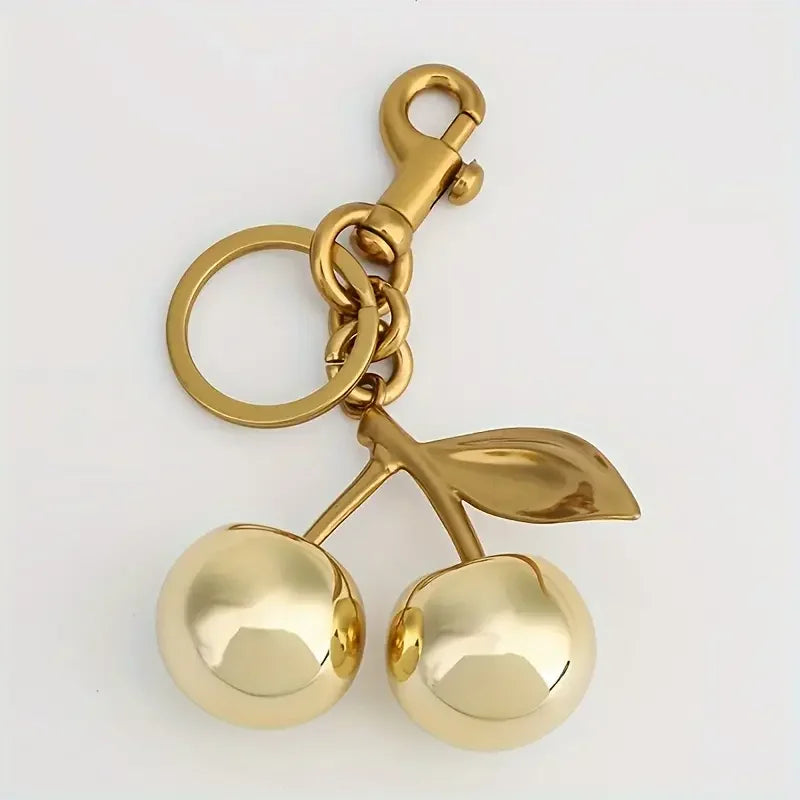 Golden Cherry Keychain Charm – Shiny Resin & Metal Bag Accessory, Elegant Gift for Women, Purse or Handbag Decoration