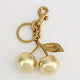 Golden Cherry Keychain Charm – Shiny Resin & Metal Bag Accessory, Elegant Gift for Women, Purse or Handbag Decoration